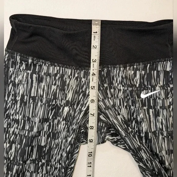 Nike women's graphic DRI-FIT tight running Capri leggings, size XS , black/white - Picture 10 of 10